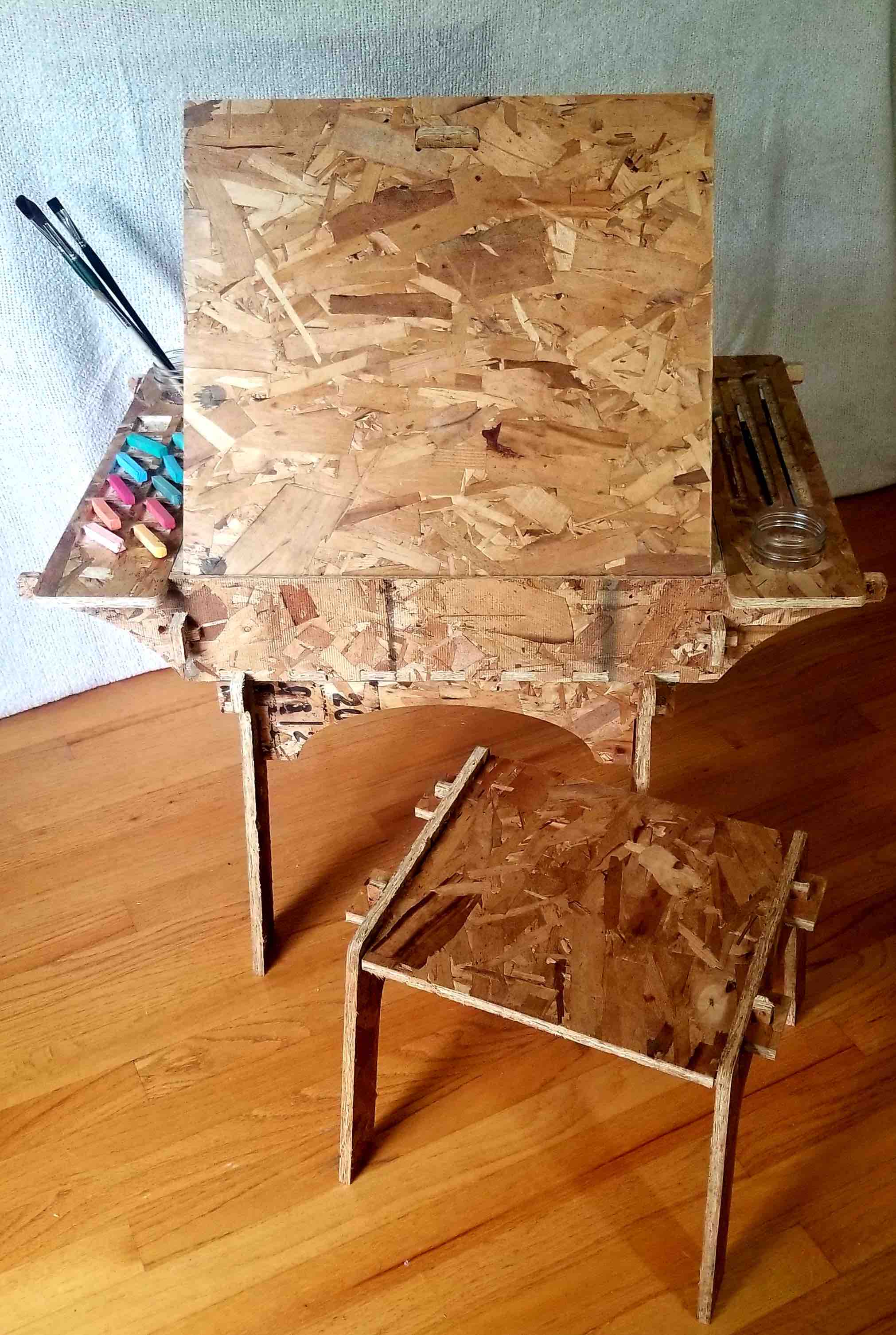 Easel-style art desk (lid open).